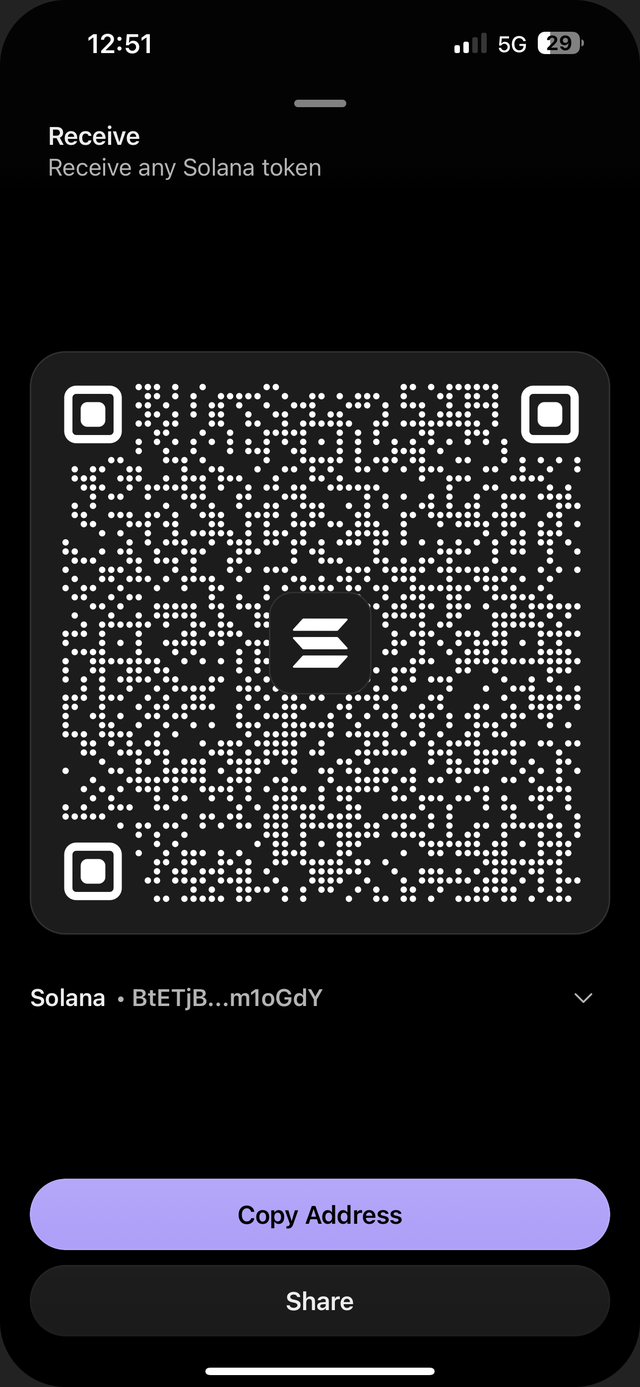 Phantom's Receive screen showing a Solana QR code above the Copy Address button